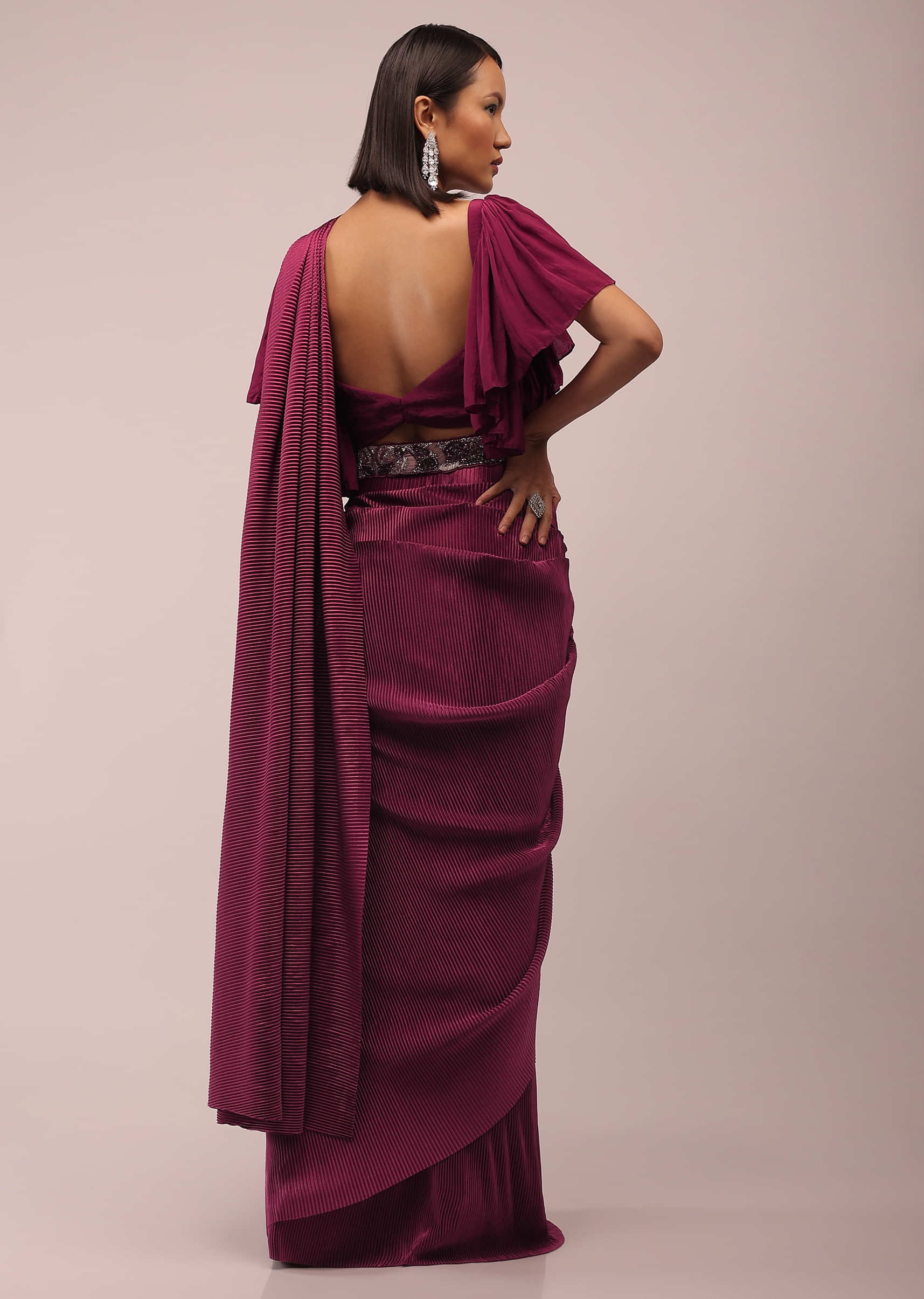 Wine Ready Pleated Saree In Crush With A Bell Sleeve Blouse And Embroidered Belt