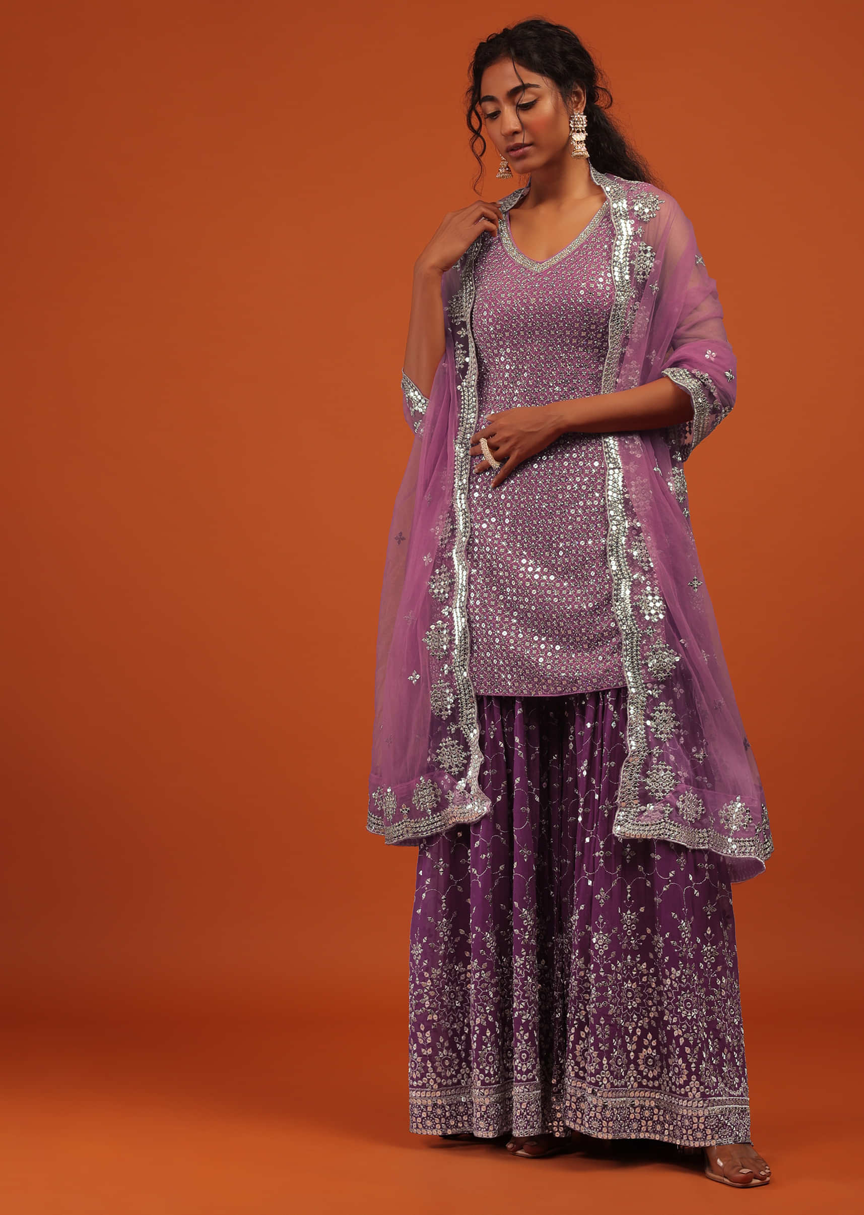 Wine Sharara Suit In Georgette With A Net Dupatta