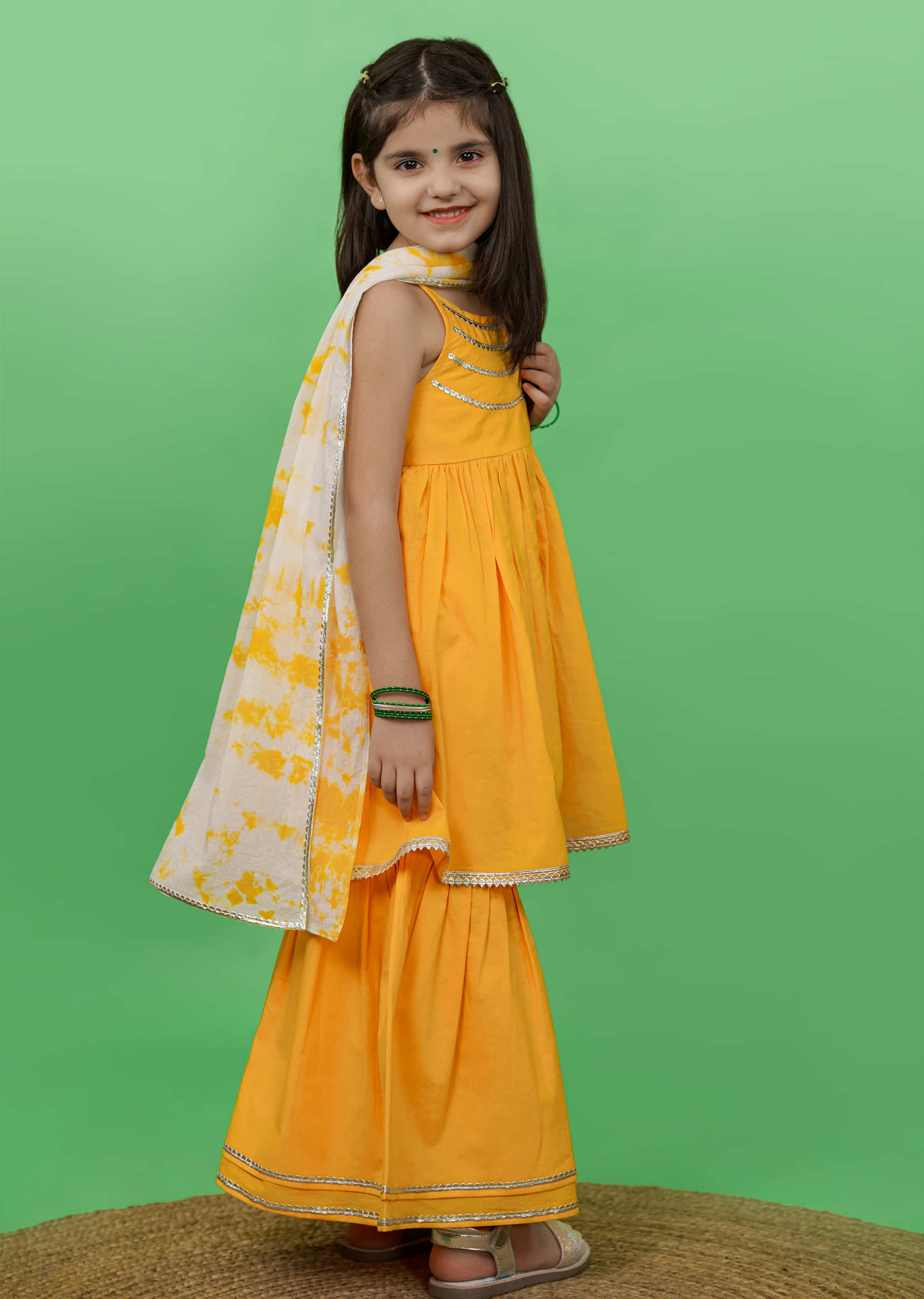 Kalki Girls Yellow Sharara Suit In Cotton With Gotta Patti Embroidery And A Tie Dye Dupatta By Tiber Taber