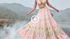 Powder Pink Lehenga Choli With Multicolor Hand Embossed Embroidery Detailing In Floral And Moroccan Motifs Online - Kalki Fashio