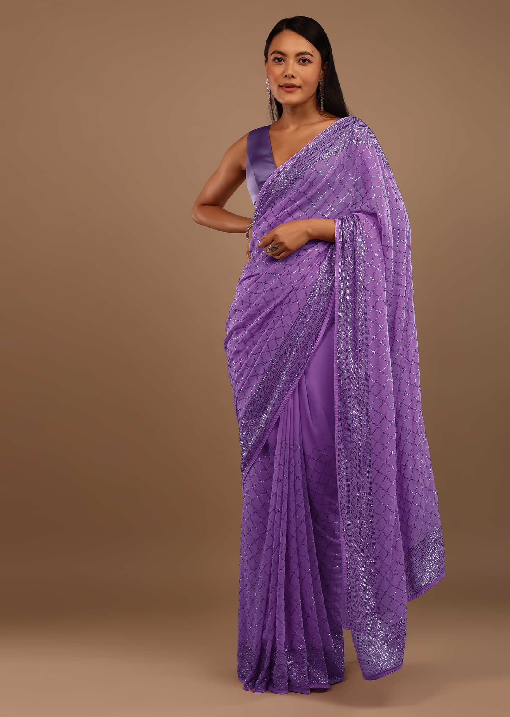 Light Purple Satin Saree With Swarovski Stonework On The Borders And A Stonework Added Unstitched Blouse