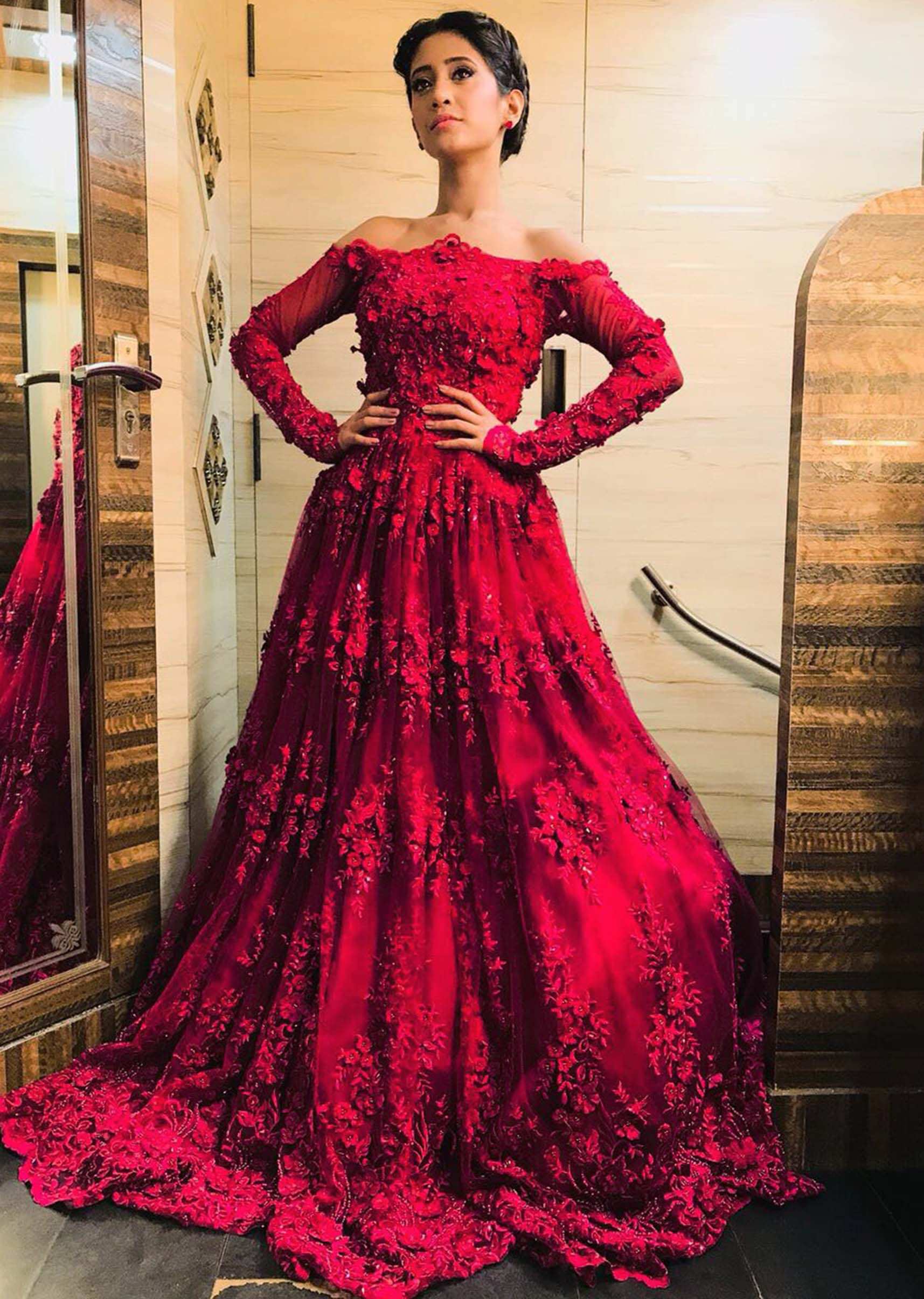 Shivangi Joshi in Kalki maroon off shoulder gown with embroidery