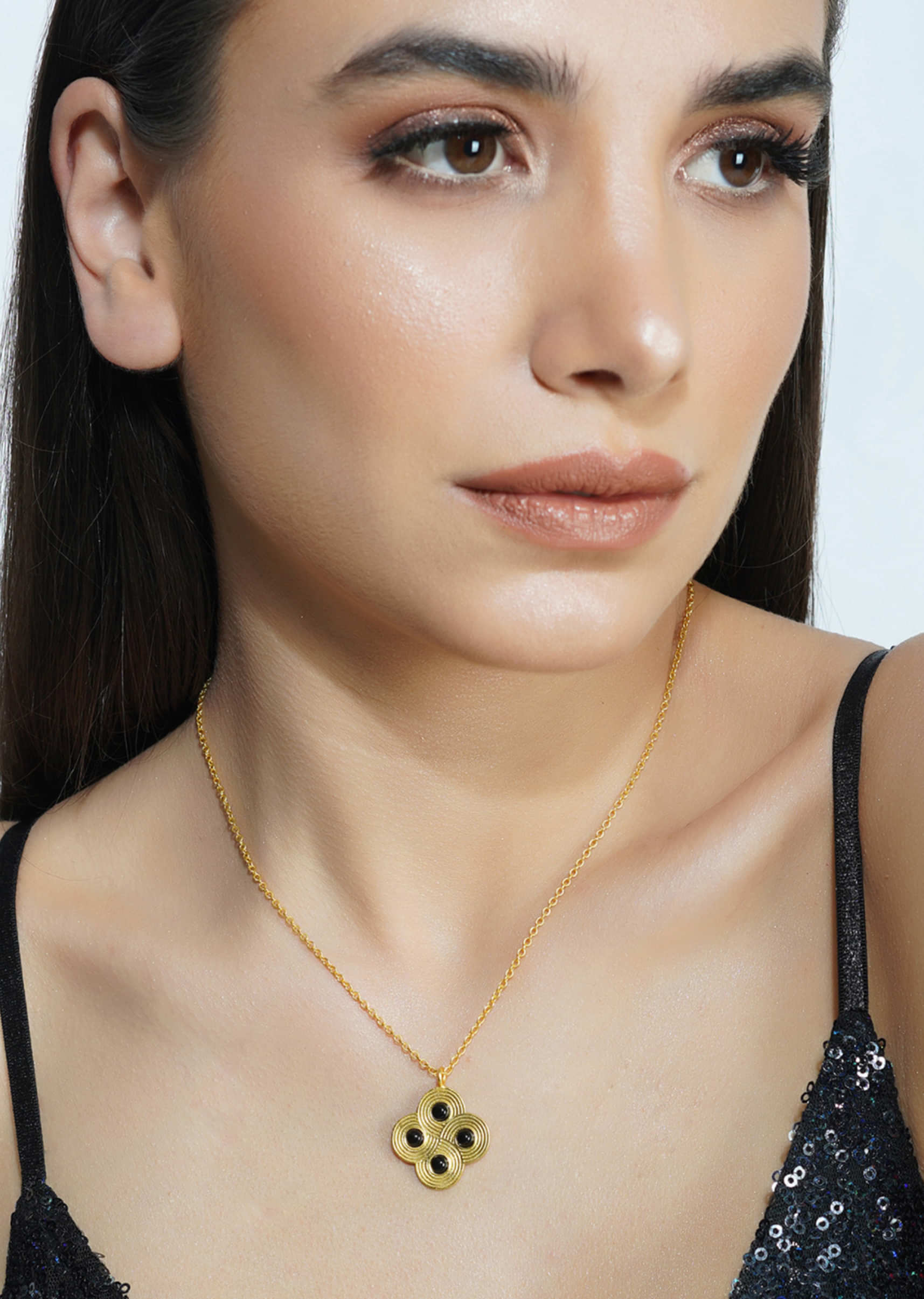 Gold Plated Necklace With A Pendant Studded With Onyx Stones