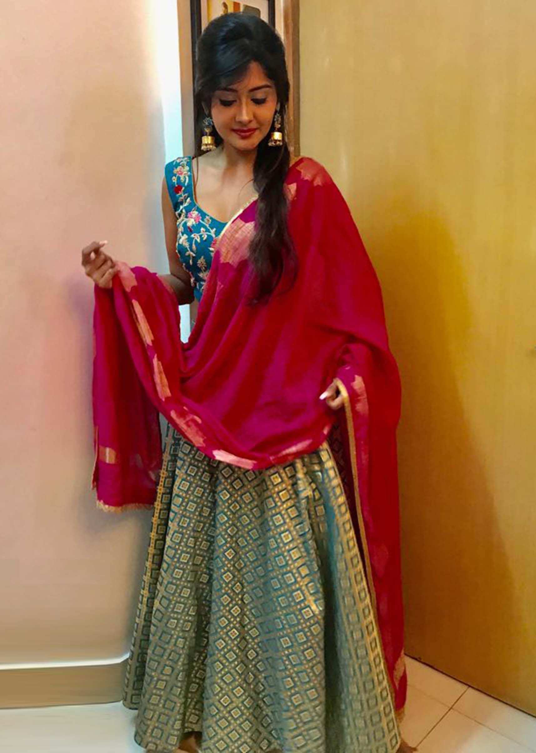 Kanchi Singh in Teal and gold brocade skirt with grey embroidered blouse only on Kalki