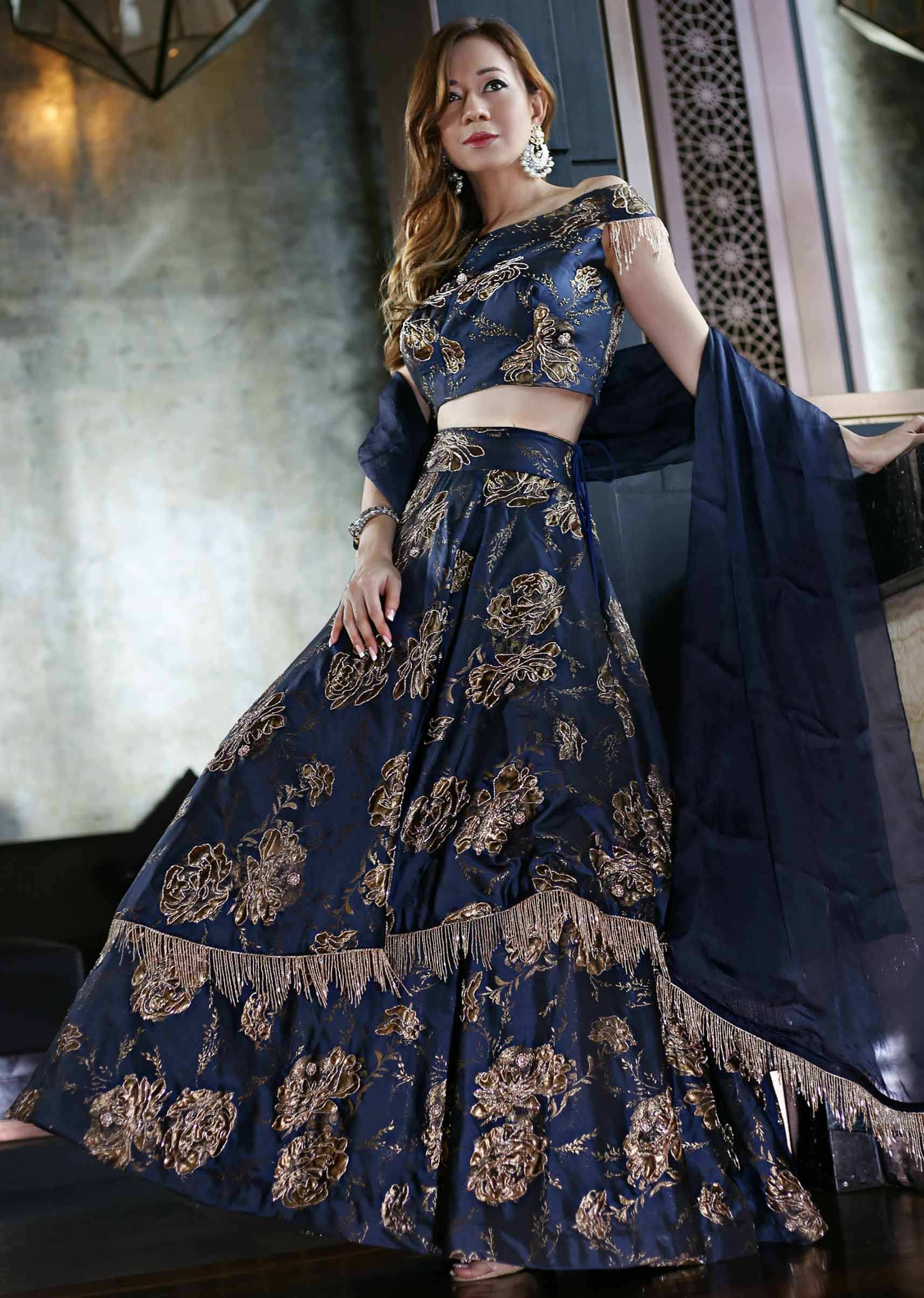 Navy Blue Silk Top, Dupatta and Skirt Featuring Foil Print, Embroidered Butti and Tassels only on Kalki