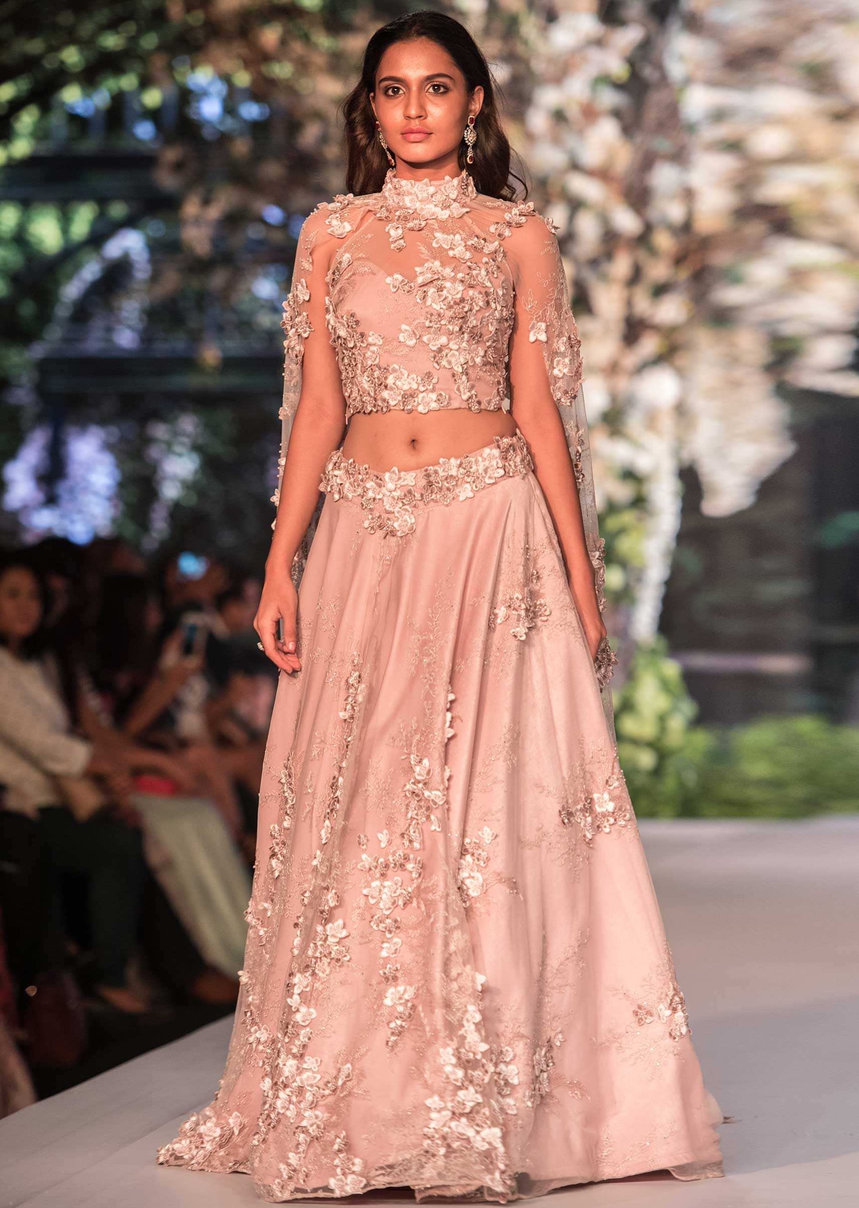 Peach lehenga matched with crop top blouse in 3D flower embroidery only on Kalki