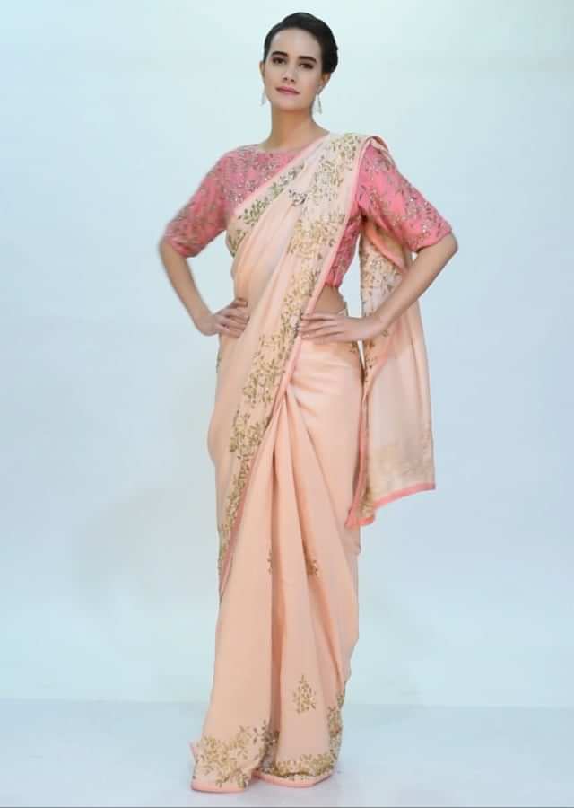 Peach cut dana embroidered saree with contrasting punch pink blouse only on Kalki