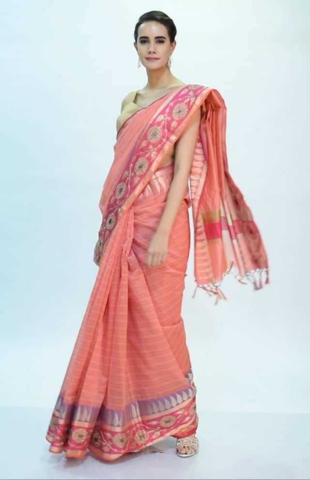 Pale peach linen saree with faded pink line  only on Kalki