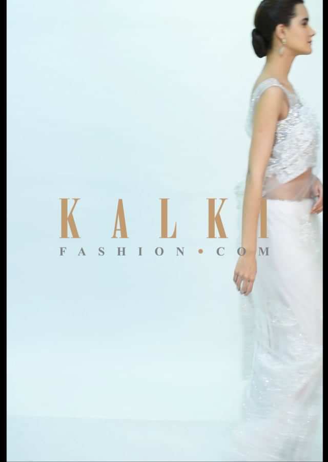 White net saree with chanty lace butti and border only on kalki