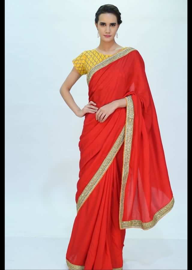 Red cotton silk saree with contrasting chrome yellow blouse only on kalki
