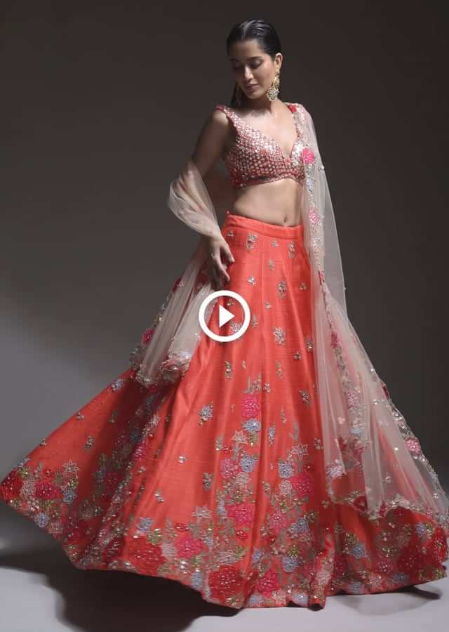 Coral Lehenga Choli With Resham Embroidered Summer Blossoms Along The Hemline And Scattered Buttis Online - Kalki Fashion Online - Kalki Fashion