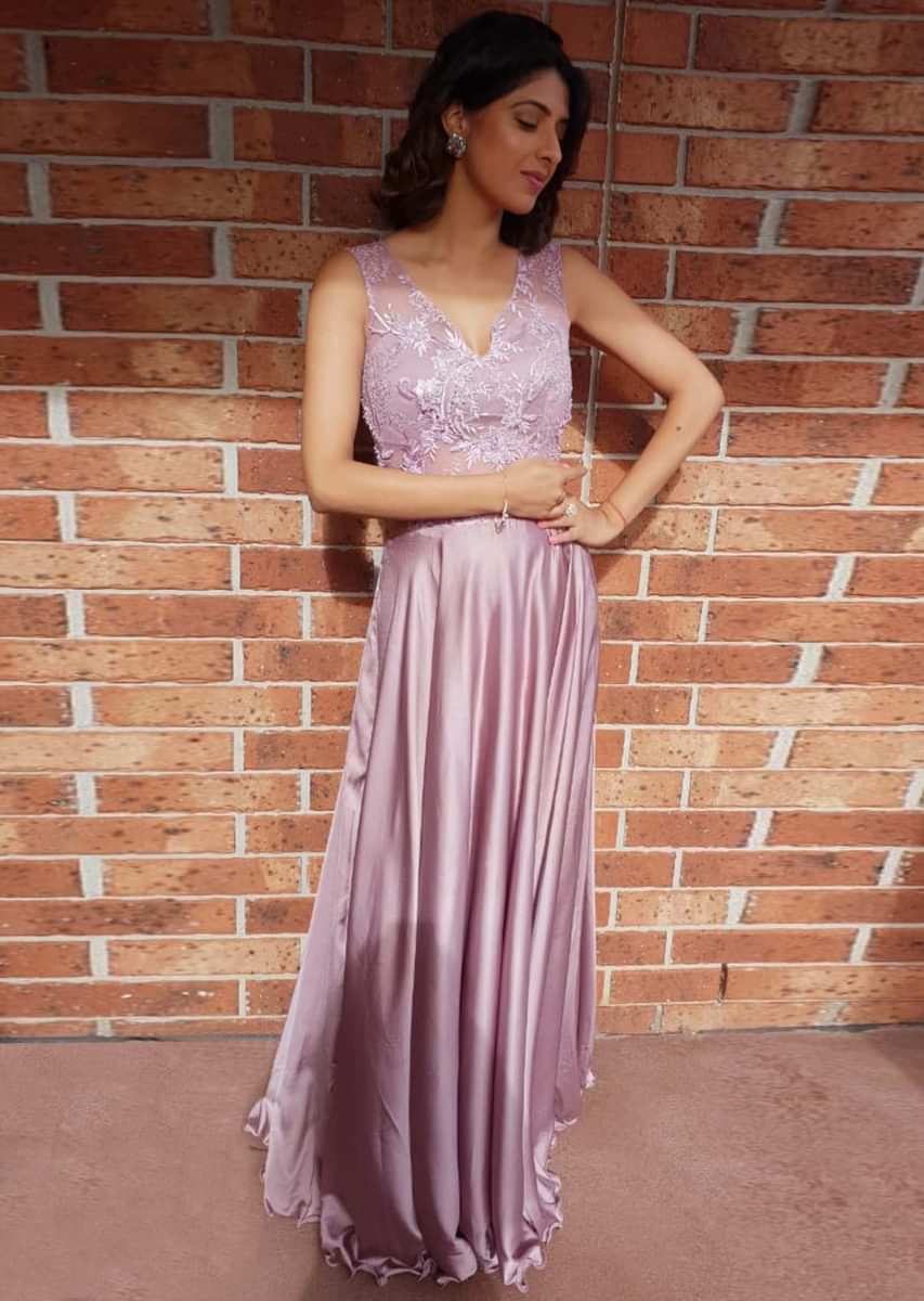 Lavender satin gown with sheer net yoke at the waist only on Kalki