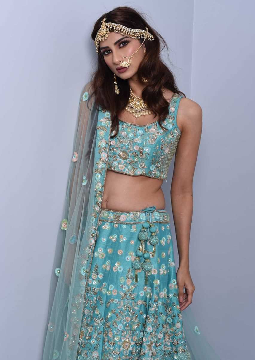 Sky blue lehenga set in heavy embroidered raw silk with floral and jaal motif Online - Kalki Fashion