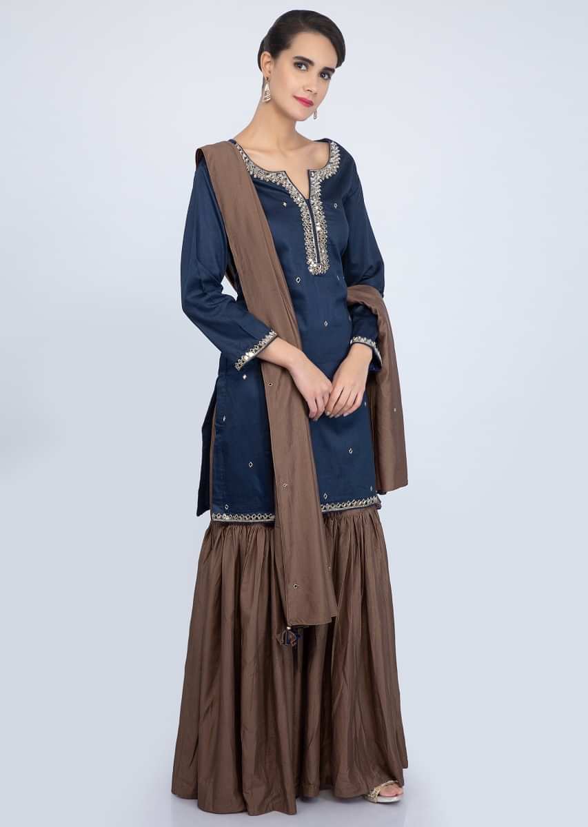 Admiral blue mirror embroidered suit with brown sharara suit and dupatta only on Kalki
