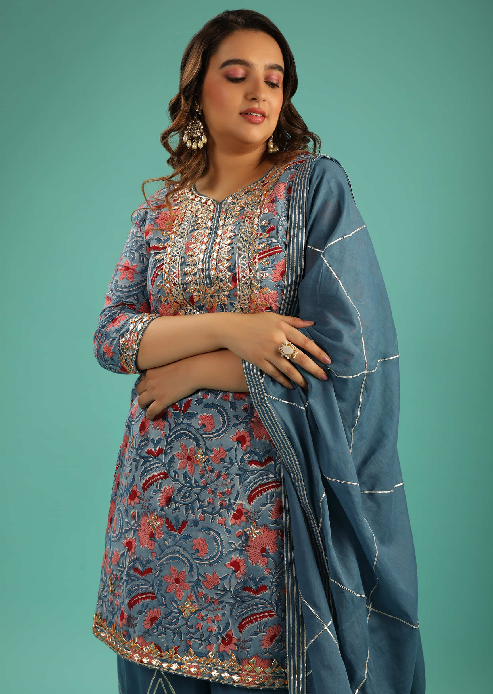Floral-Printed Airforce Blue Sharara Suit With A Gotta Patti Embroidered Yoke.
