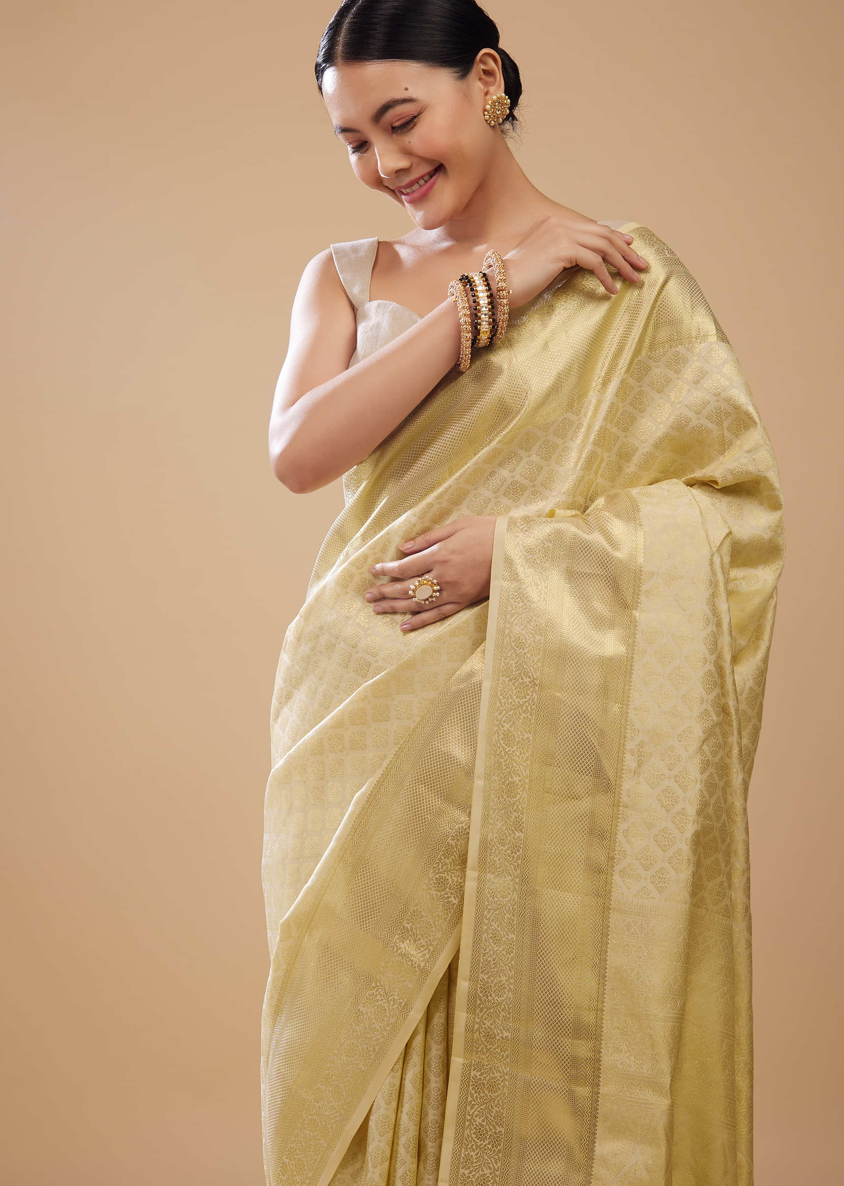 Cream White Kanjivaram Silk Saree In Intricate Weave