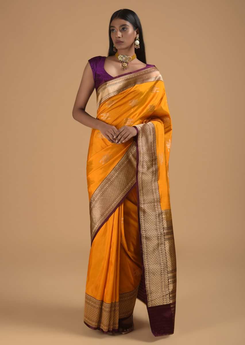 Amber Yellow Pure Handloom Saree In Silk With Woven Text Motifs And Purple Border