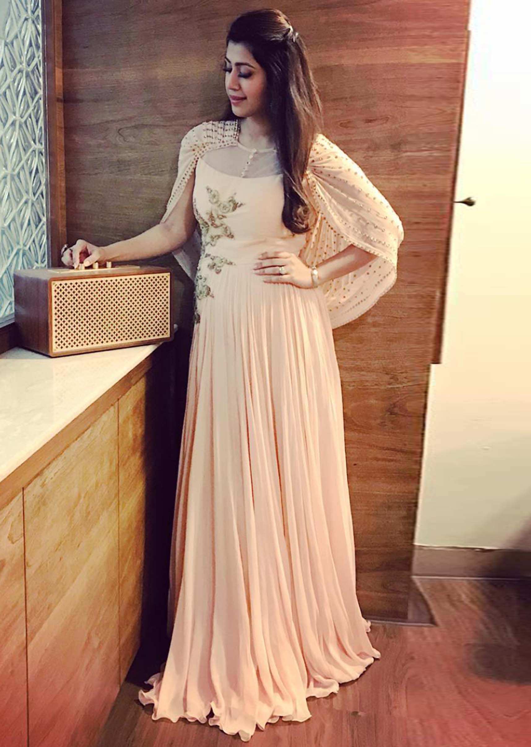 Ankita Bhargava in Kalki dull pink gown with embroidred bodice and fancy cape 