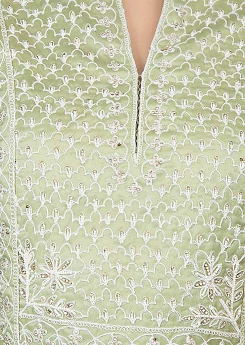 Apple green thread embroidered suit with white lucknowi palazzo and net dupatta only on Kalki