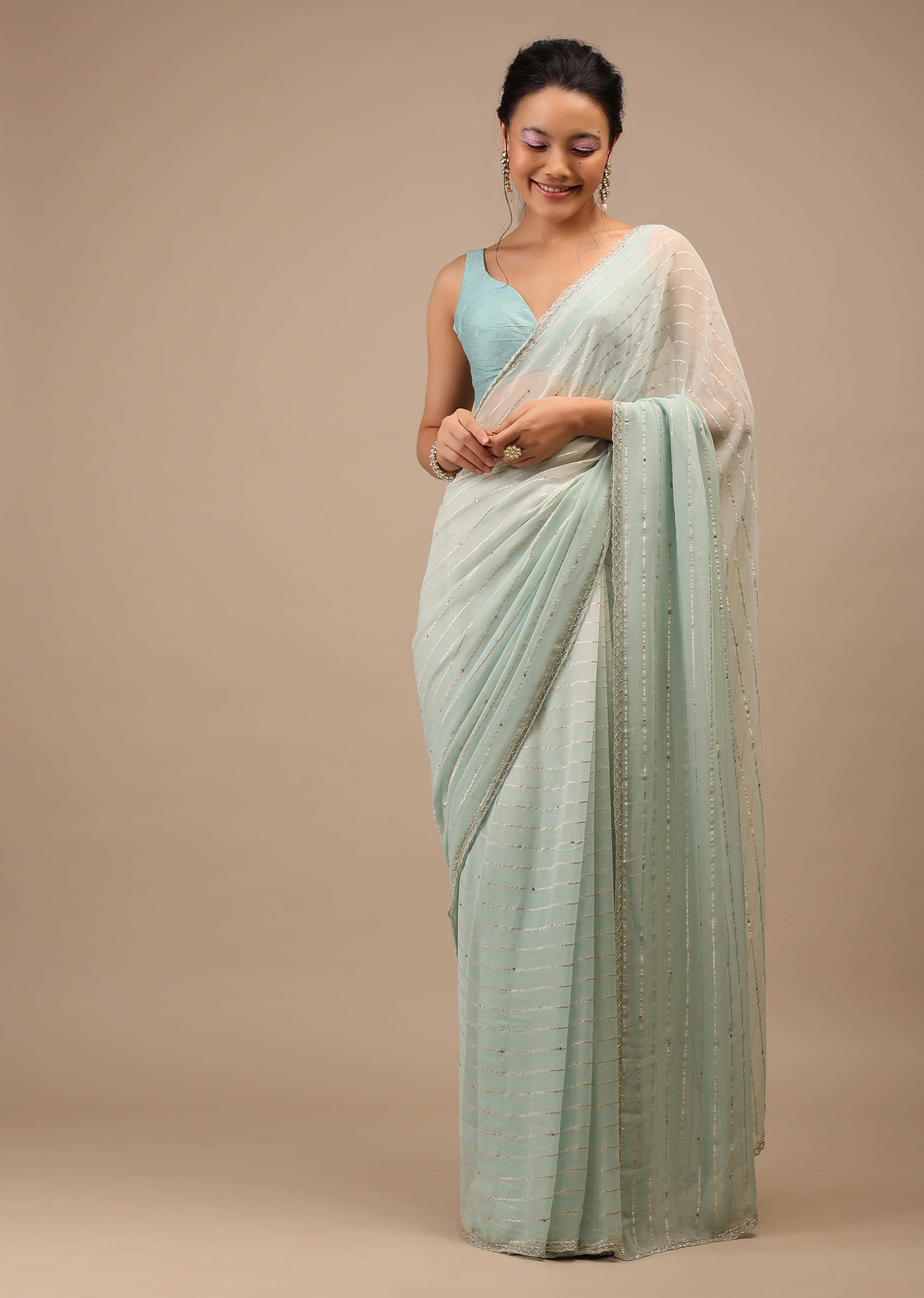 Off White Georgette Saree With Cut Dana Zardosi Embroidery Along With  Copper Detailing