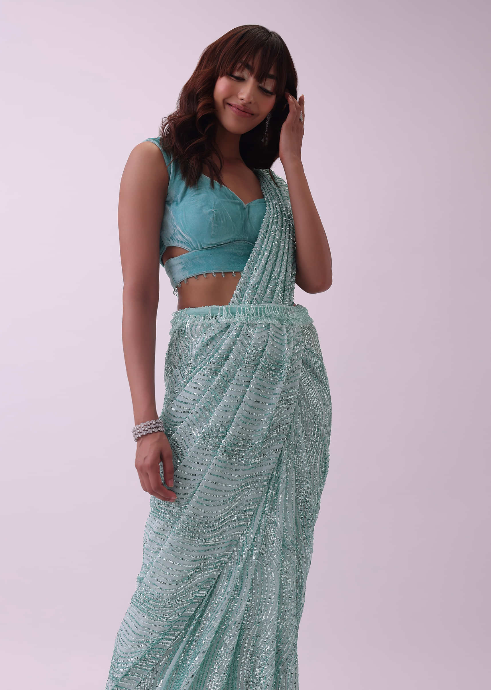 Aqua Blue Saree And Stitched Velvet Blouse With Hanging Crystals