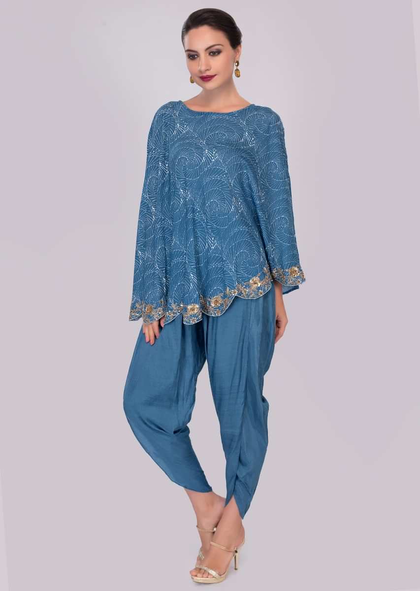 Azure blue dhoti pant paired with cape top in print and scallop border 