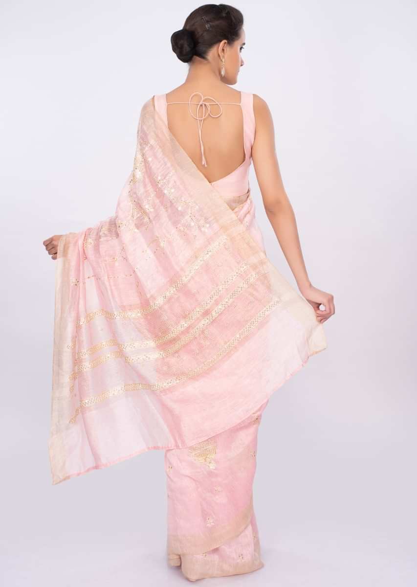 Baby pink linen saree with embroidered butti only on kalki