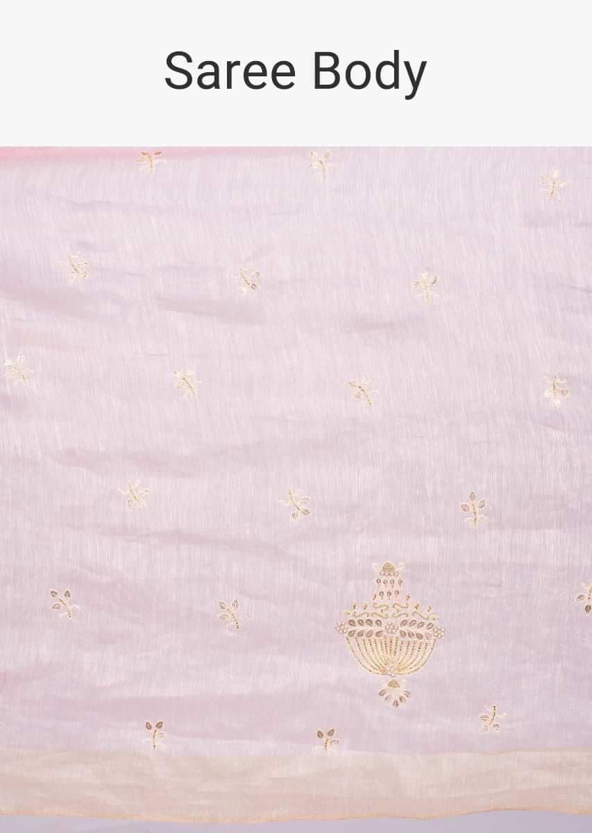 Baby pink linen saree with embroidered butti only on kalki