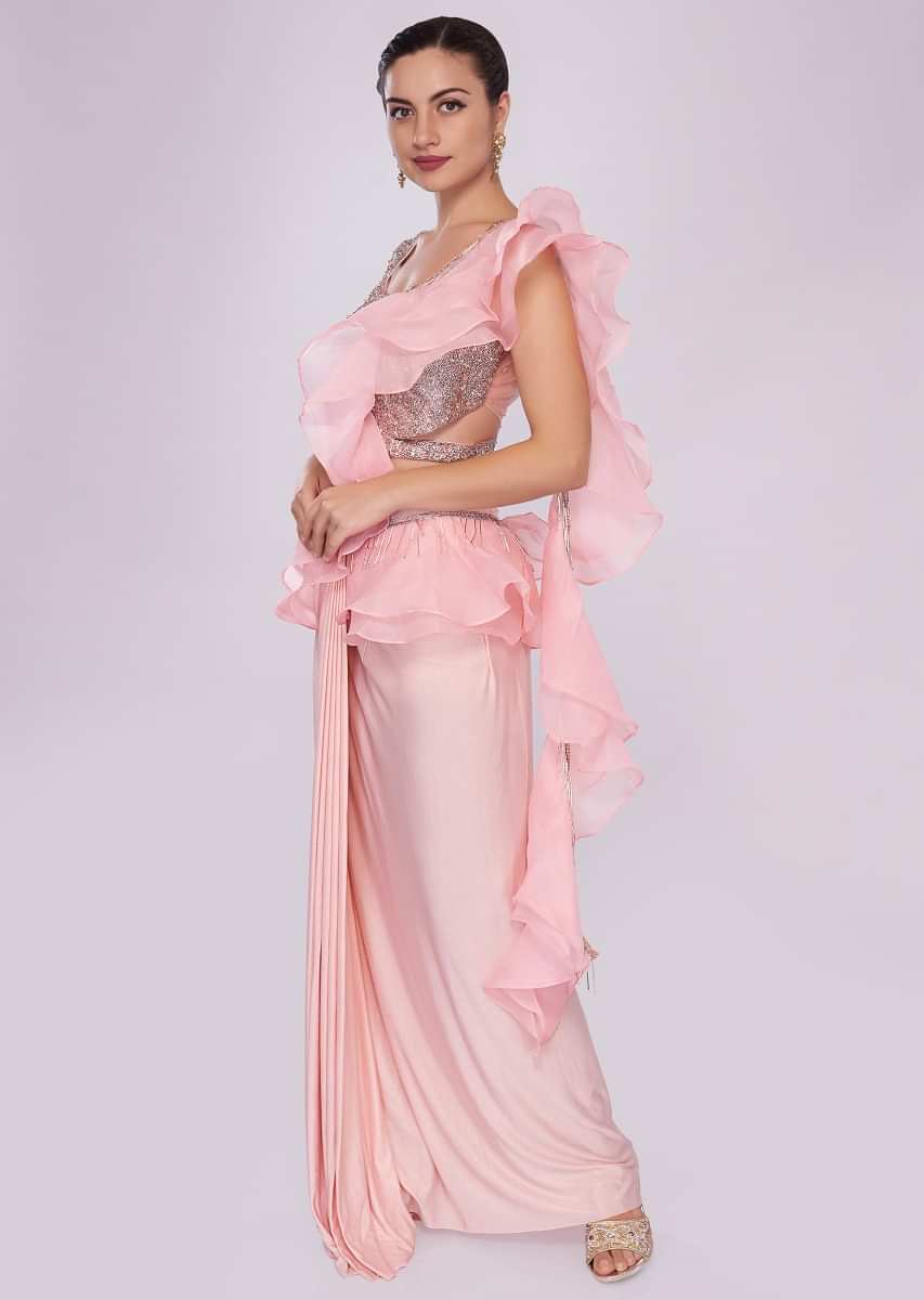 Baby pink lycra saree with draped pleats and ruffled organza pallo 