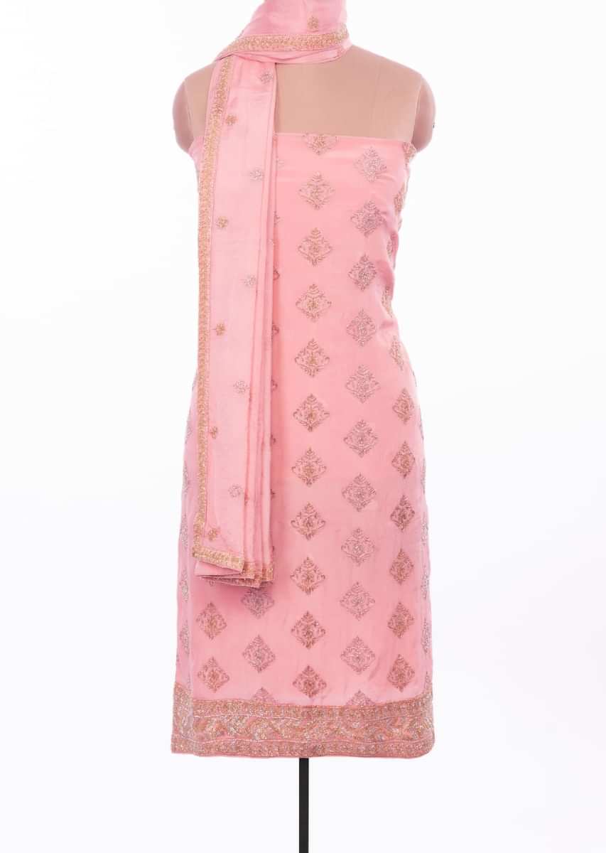 Baby pink unstitched suit set with cut dana and resham embroidered butti and border only on Kalki