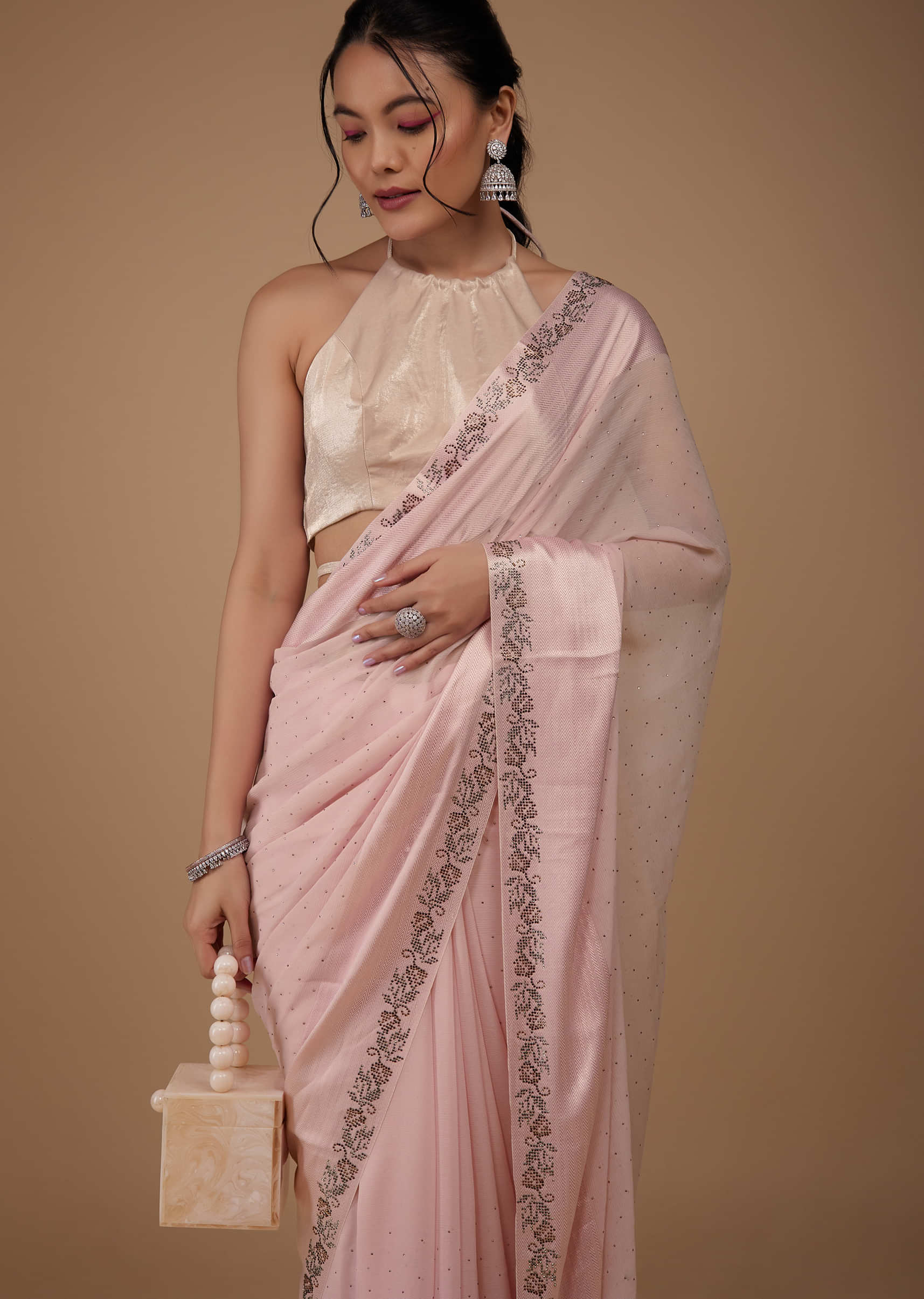 Baby Pink Chiffon Saree With Stone Embellishments And Satin Border