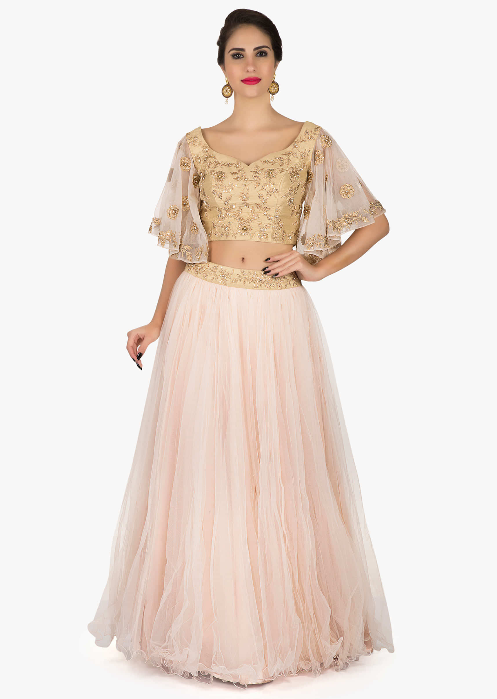 Baby Pink lehenga in net with a ready blouse flaunting the bell sleeves in Zardosi only on Kalki 