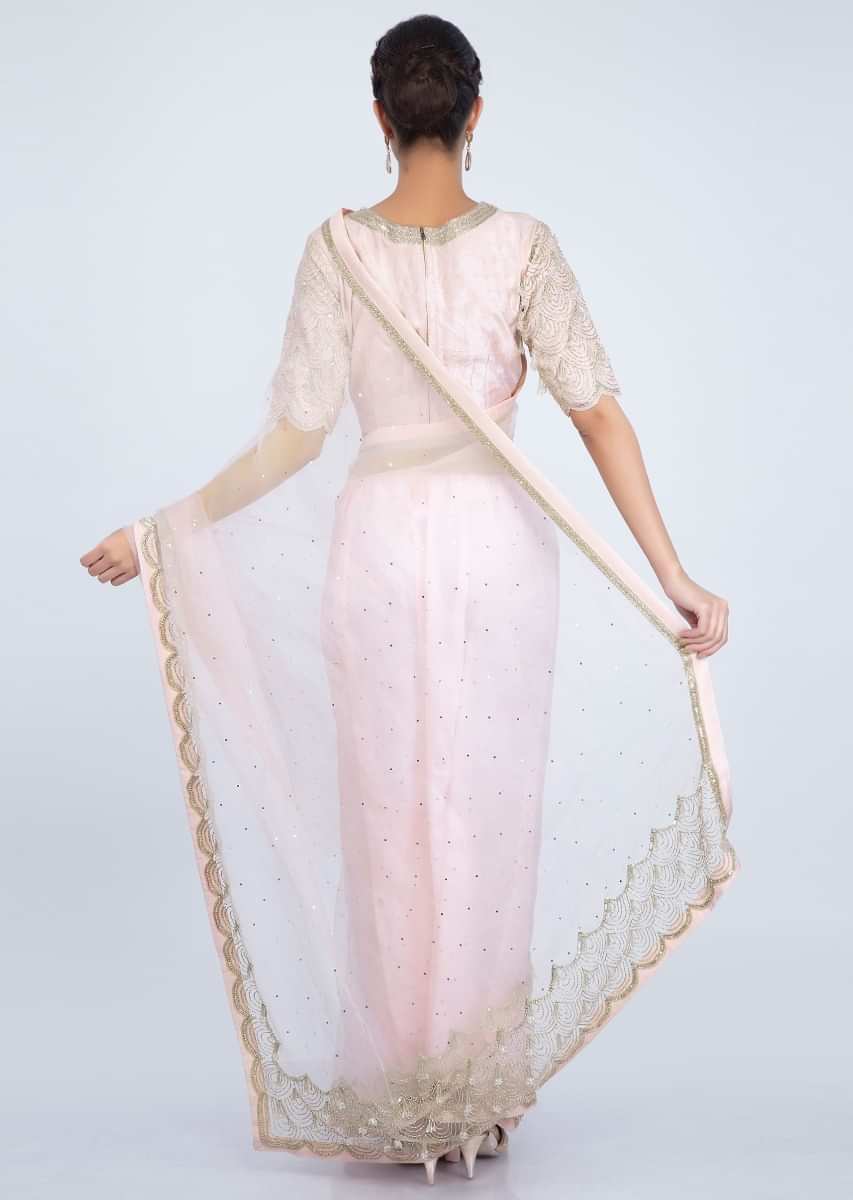 Ballet pink sheer net with matching raw silk blouse only on kalki