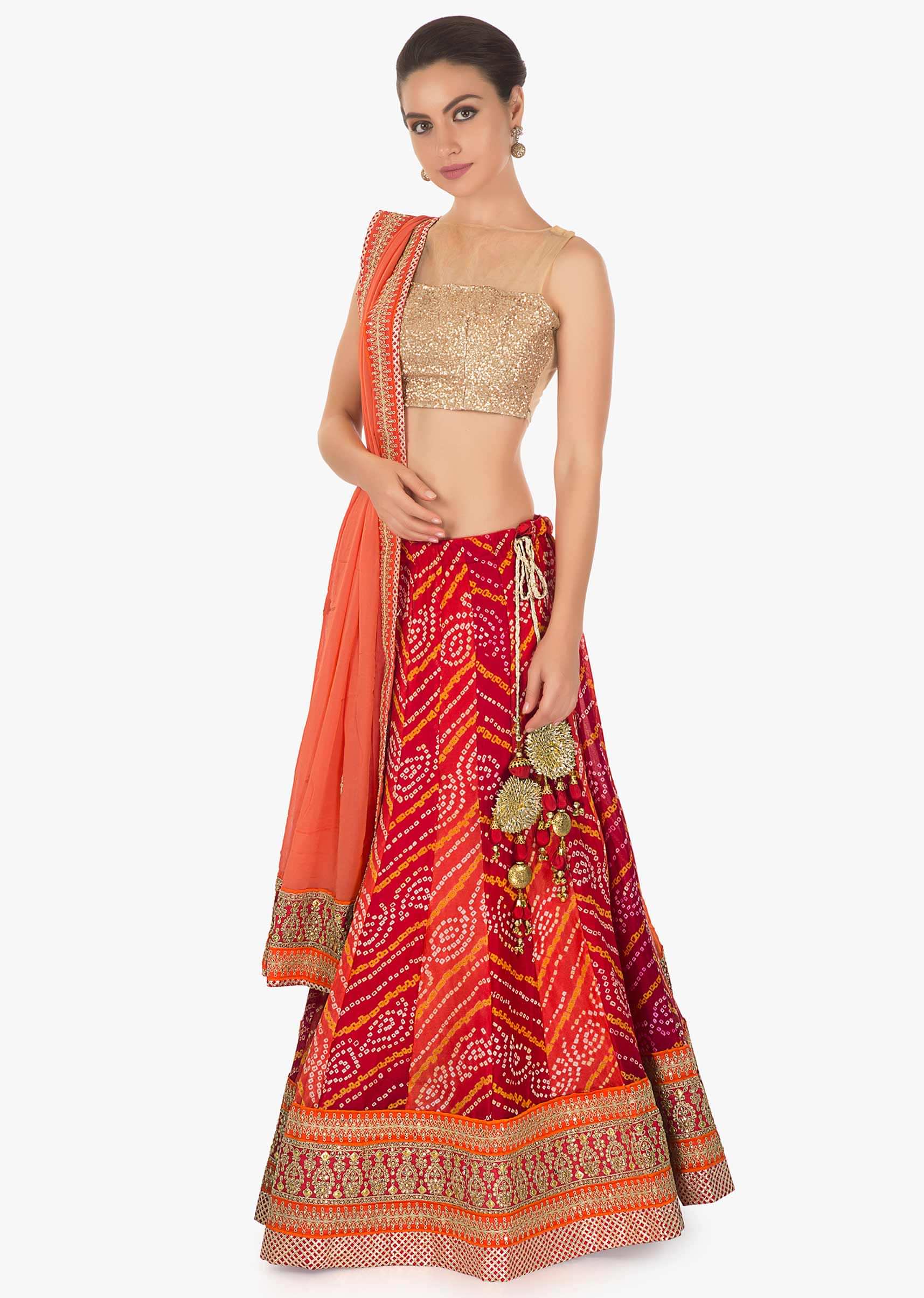 Bandheni georgette lehenga with alternate kali matched with peach georgette dupatta only in kalki