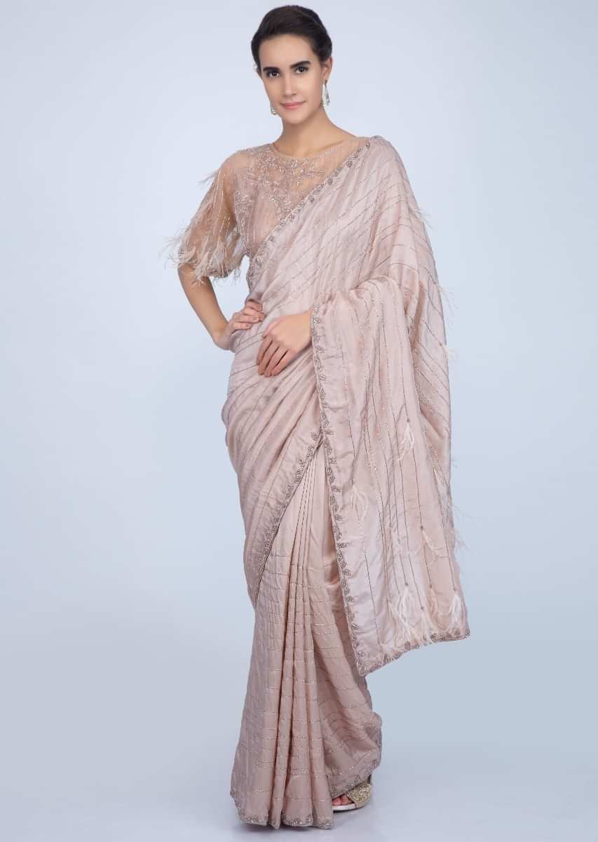 Beige silk cut dana embroidered saree with feathers only on Kalki