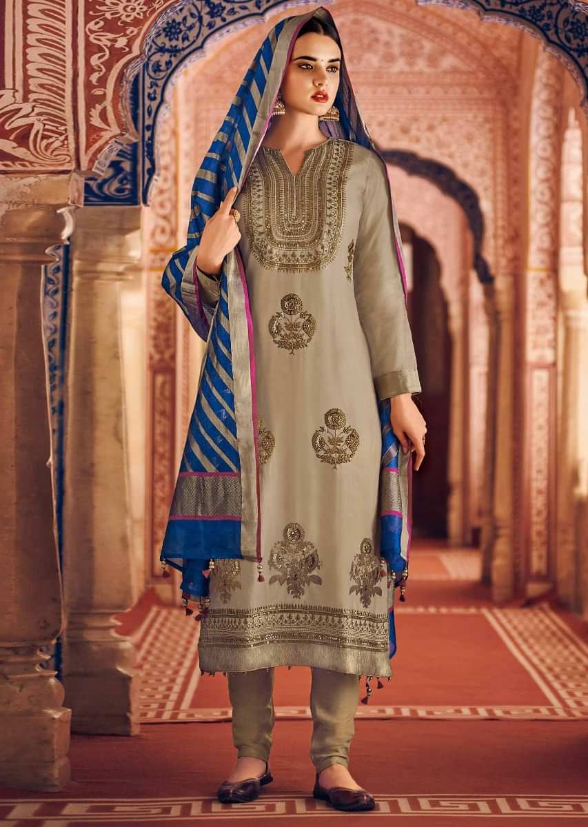 Beige straight suit in silk with embroidered placket and butti 