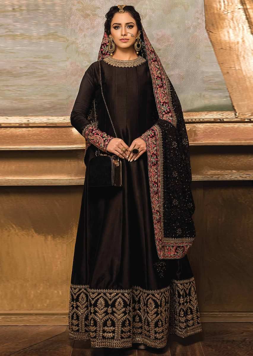 Black anarkali suit in raw silk with embroidered neckline and hem 