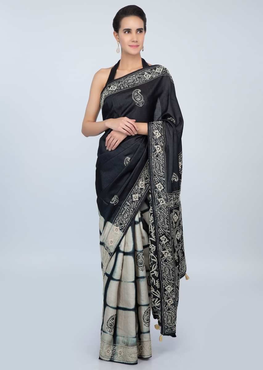 Black and cream shaded half and half tussar silk saree in batik print and thread embroidery only on kalki