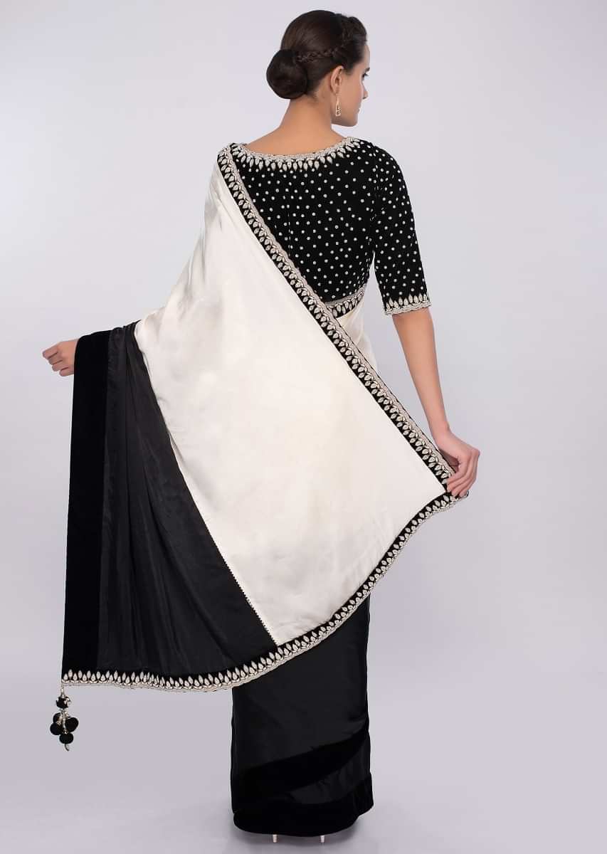 Black and white satin saree with embroidered velvet border only on kalki