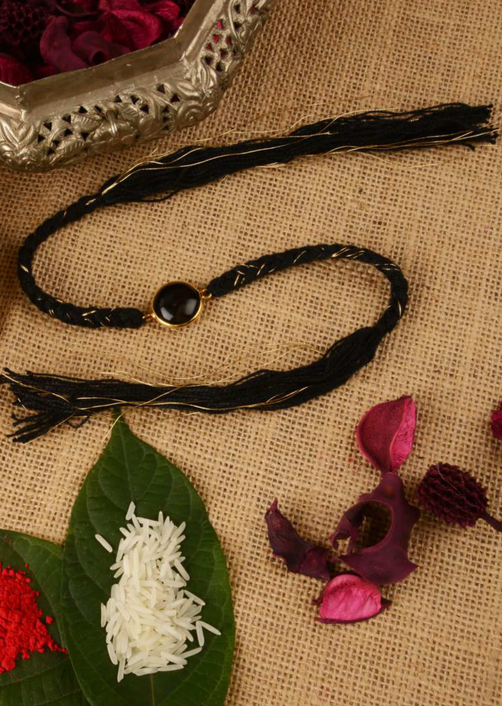 Buy Black Braided Rakhi In Gold And Black Thread Work Is Further Enhanced  In Semi-Precious Stone