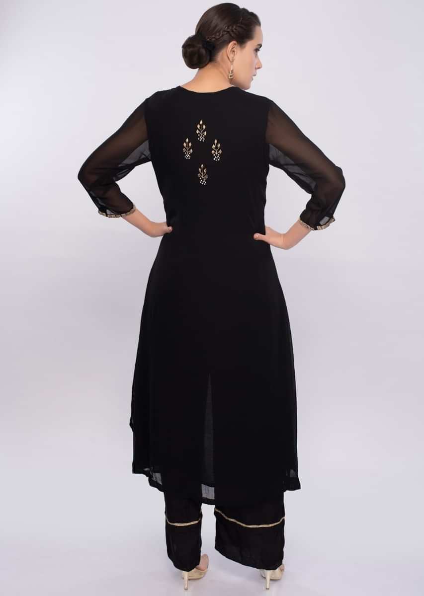 Black embroidered georgette suit with black satin pant only on Kalki