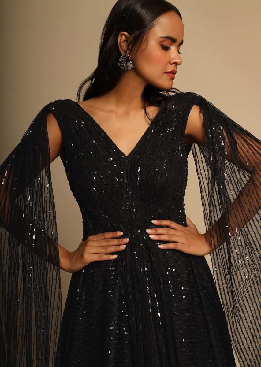 Buy Black Gown In Sequins Embellished Net With Ruching In The Front, Sheer  Sides And Net Cape On Each Shoulder Online - Kalki Fashion