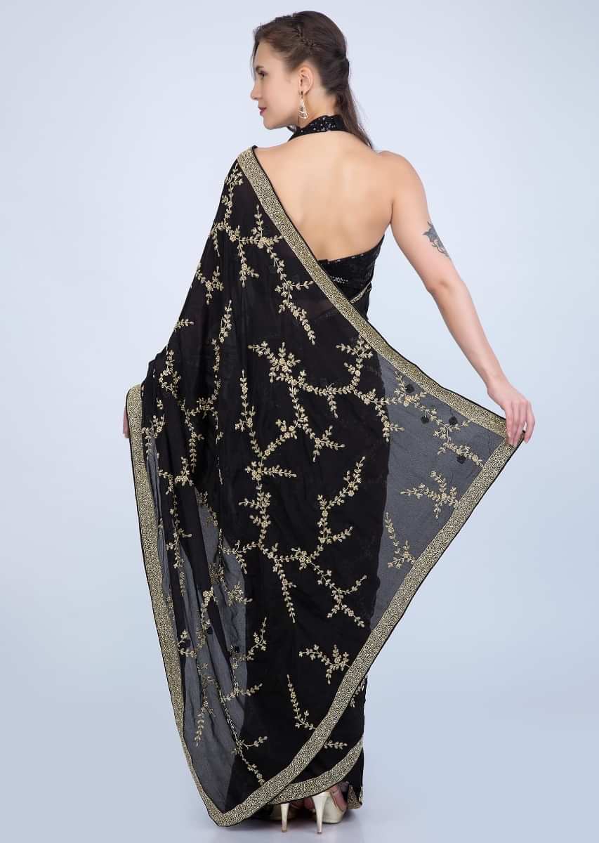 Black heavy satin chiffon saree with floral jaal embroidery only on Kalki