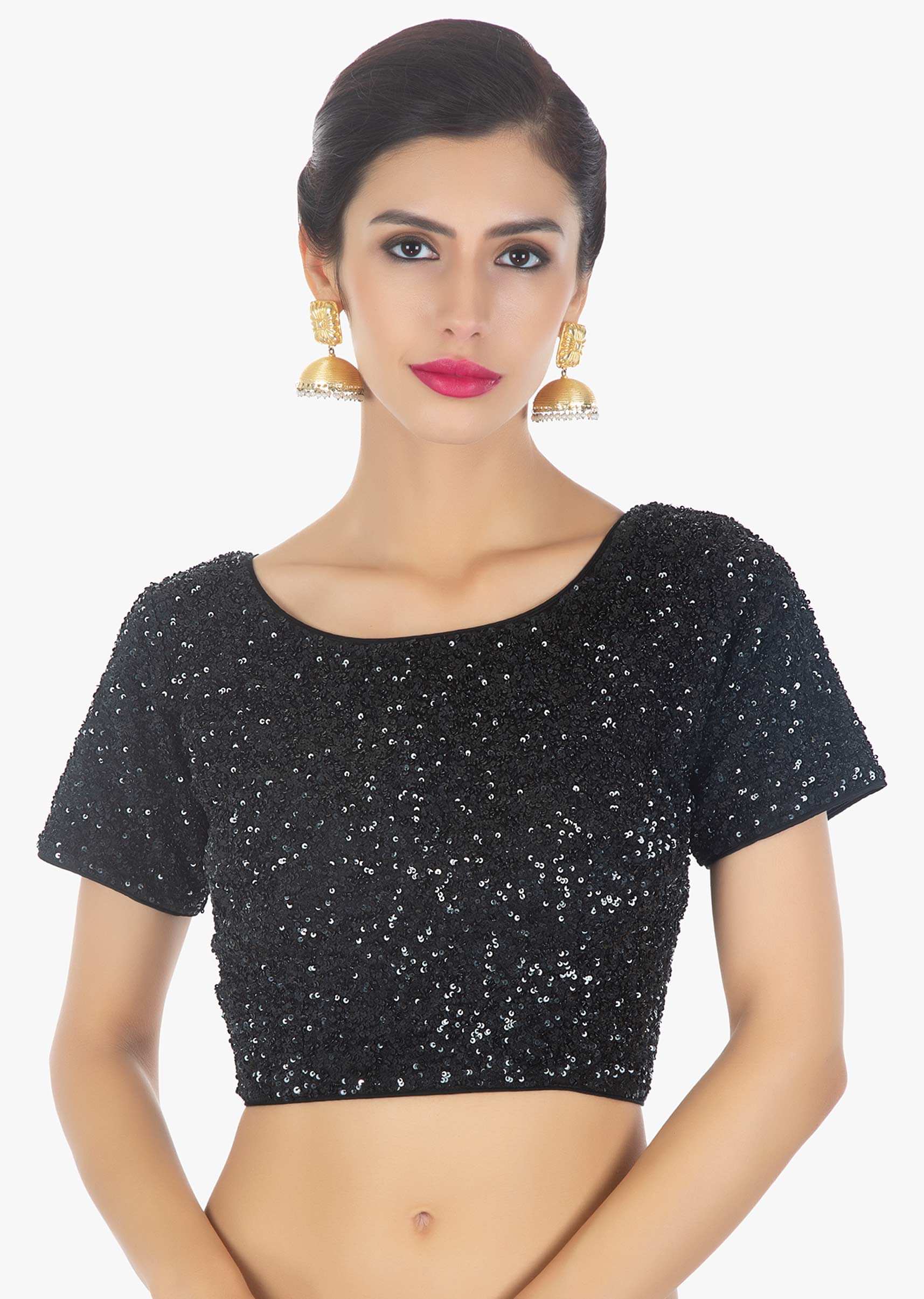 Black net thread embroidered saree paired with a shimmery sequins blouse