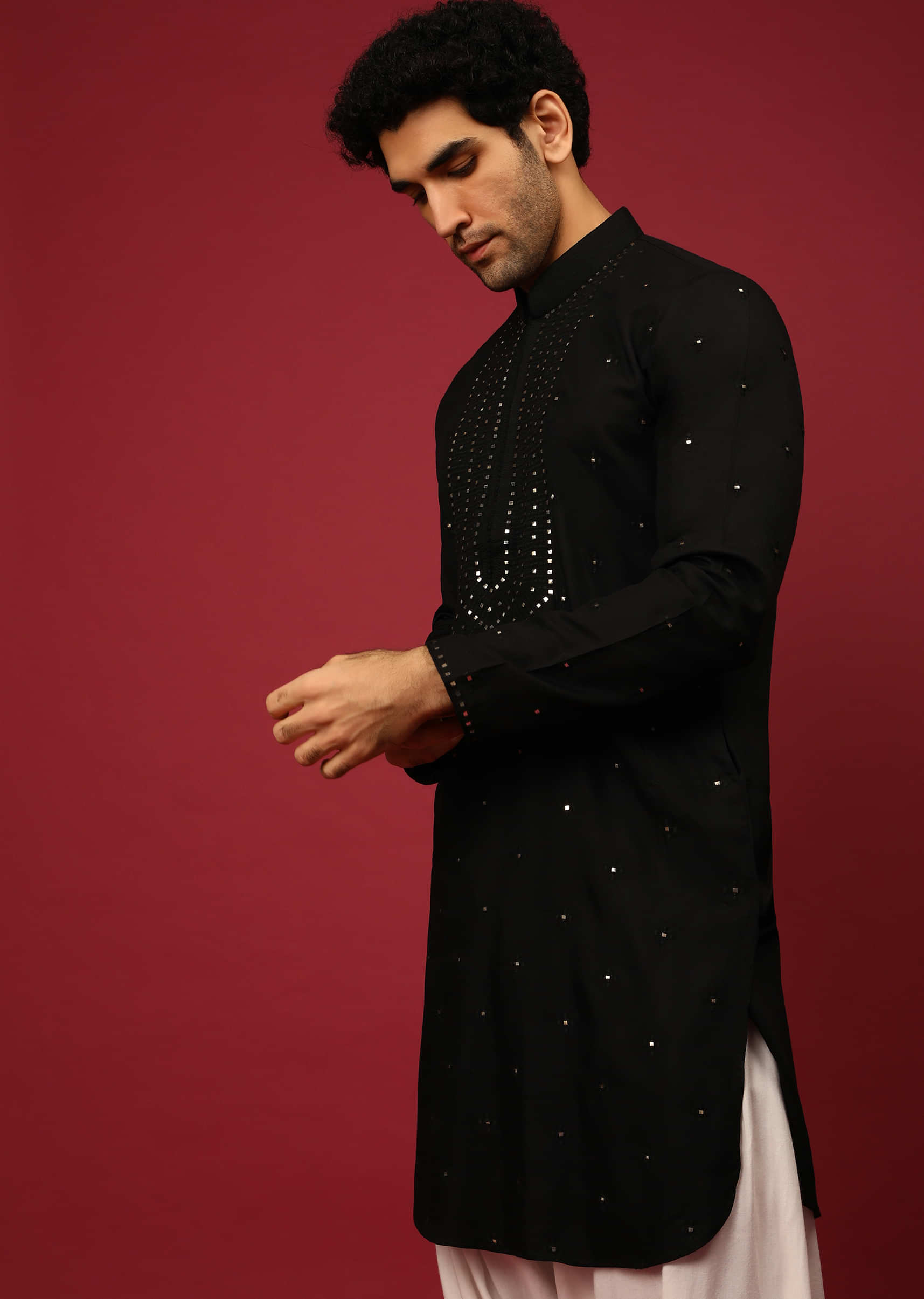 Black Pathani Suit In Cotton With Mirror And Thread Embroidered Buttis And Heavy Placket Design  