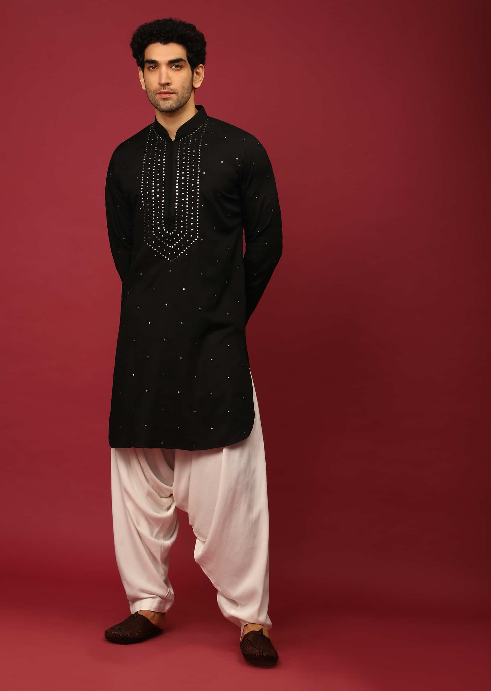 Black Pathani Suit In Cotton With Mirror And Thread Embroidered Buttis And Heavy Placket Design  