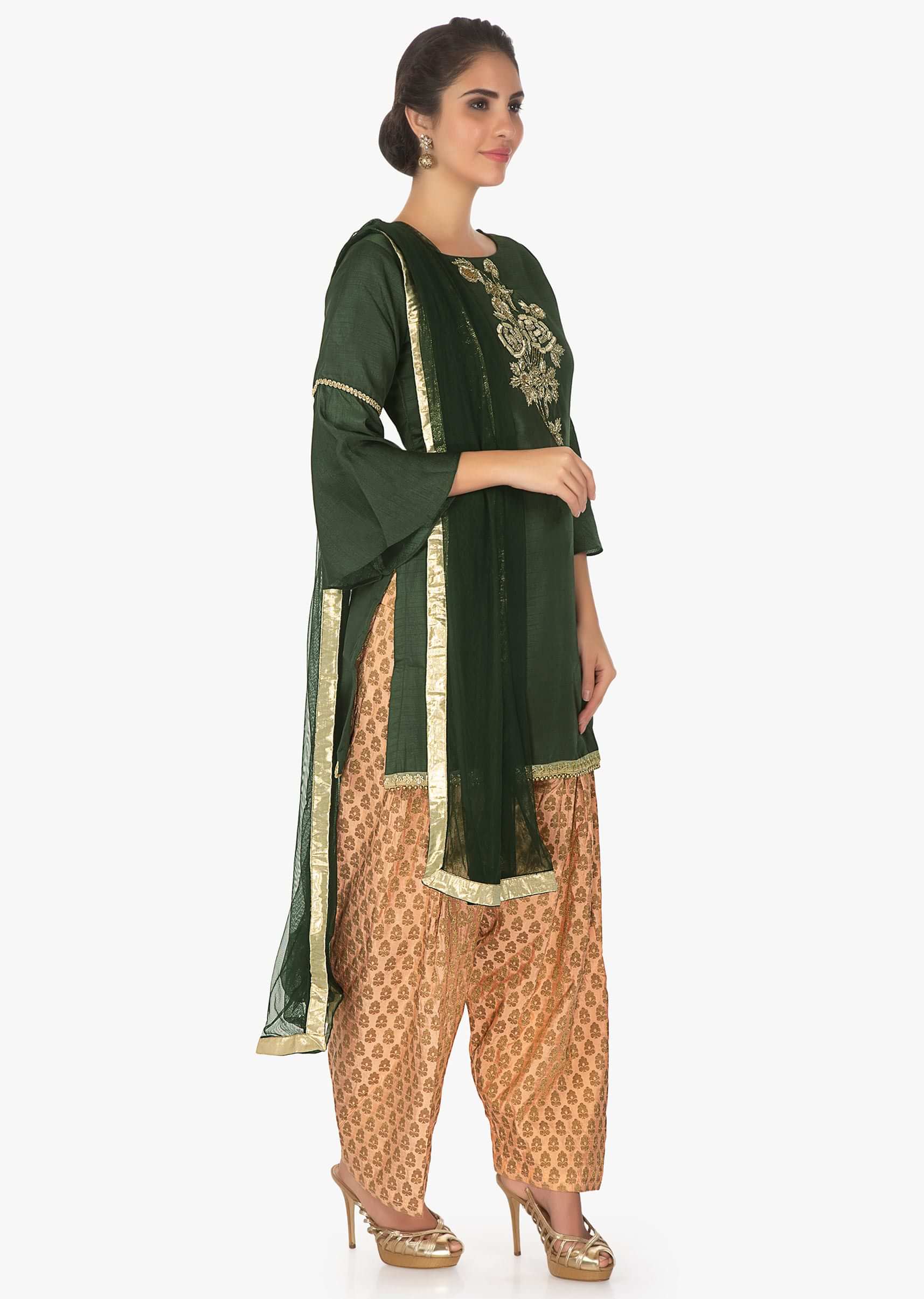 Black raw silk embellished top paired with beige weaved  pant and net dupatta 