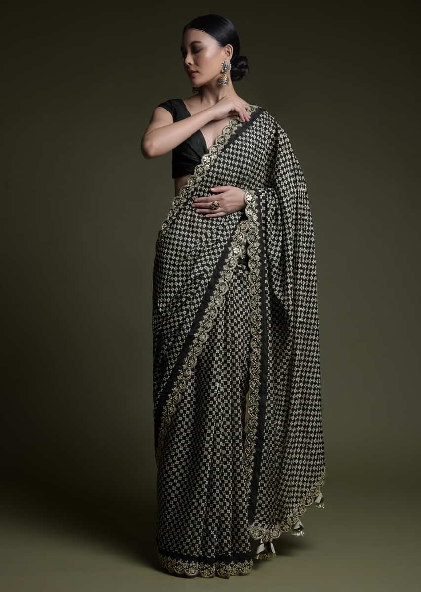 Black Saree In Soft Silk With Printed Floral Buttis, Scalloped Gotta Patti Border And Unstitched Blouse