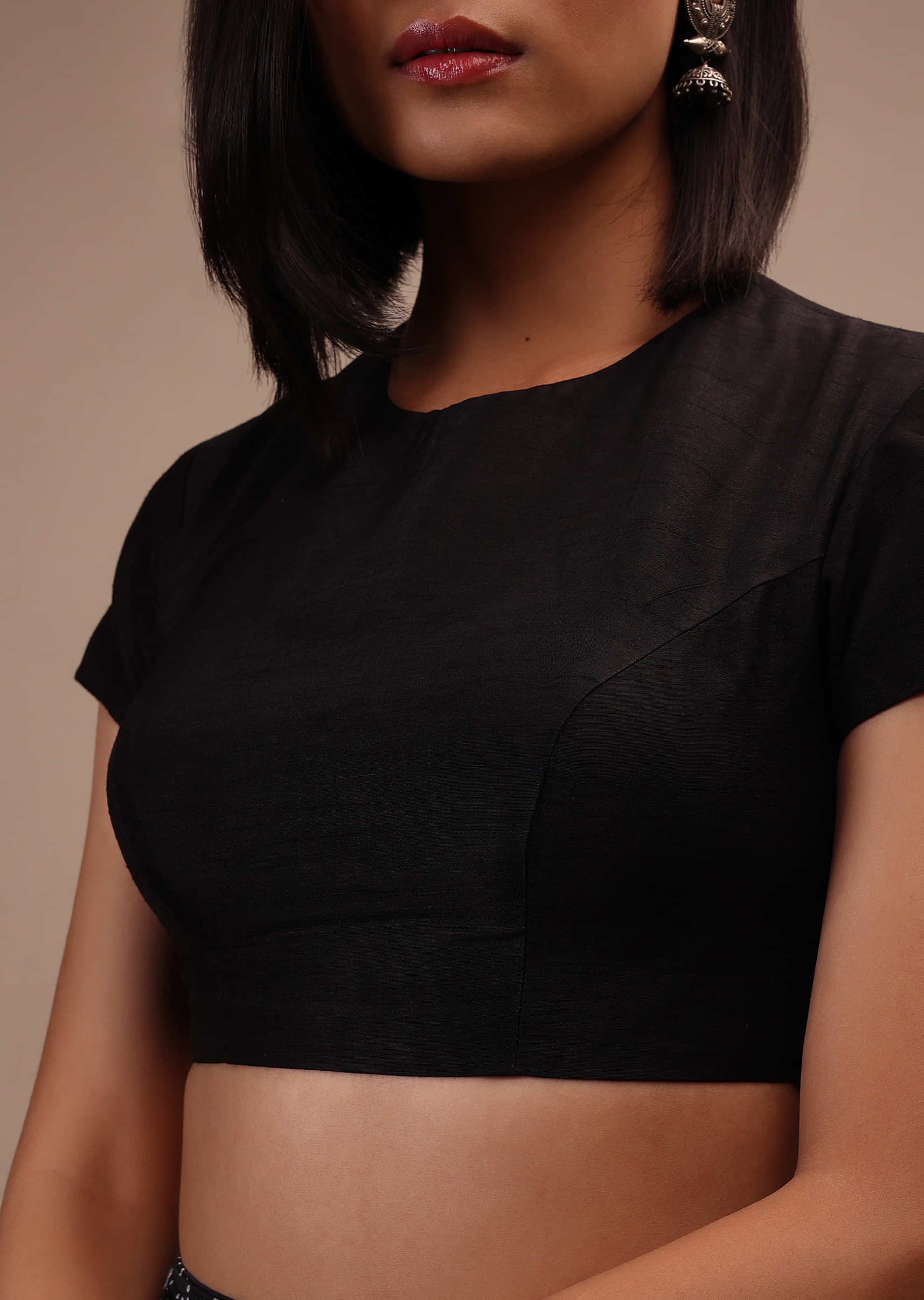Black Cap Sleeves Blouse In The Round Neck. Raw Silk With Cut Out Back Neck And Hook Closure