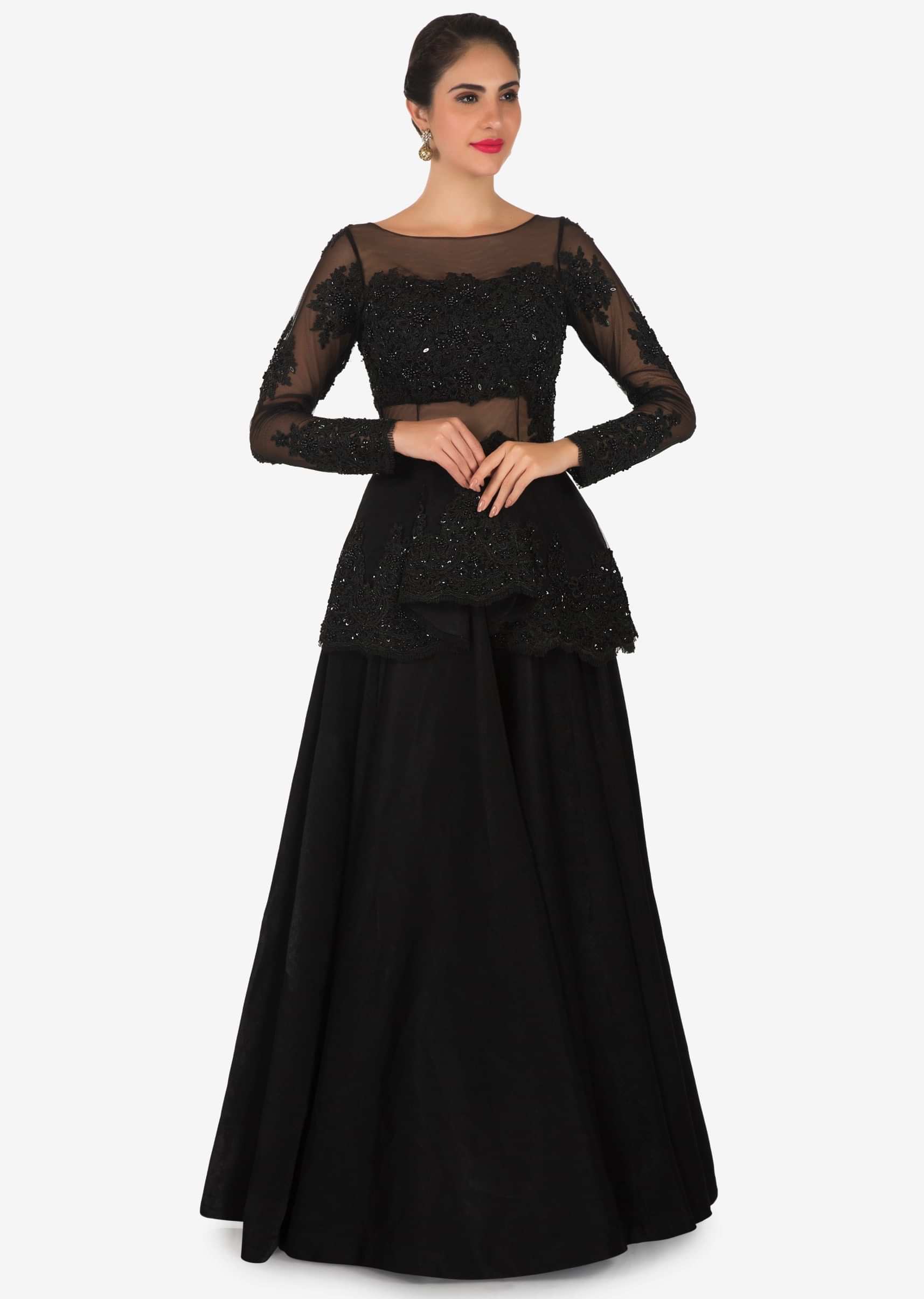 Black gown in net enhanced in embroidered pleated neckline only on Kalki